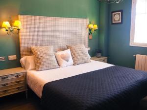 Posteľ alebo postele v izbe v ubytovaní Hotel Rural la Concordia