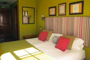 Posteľ alebo postele v izbe v ubytovaní Hotel Rural la Concordia