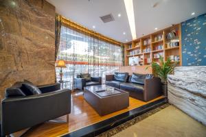 Posezení v ubytování Relteem Hotel
