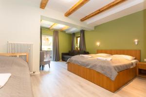 Posteľ alebo postele v izbe v ubytovaní Hotel Landhaus Lungau