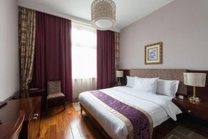 Una cama o camas en una habitación de Hotel Alibi Sabac