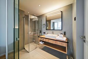Koupelna v ubytování Hotel Federwerk