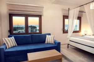 Krevet ili kreveti u jedinici u objektu PORTO PORTES suites