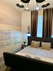 Postel nebo postele na pokoji v ubytování Veronika Rooms