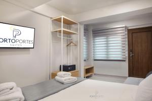 Krevet ili kreveti u jedinici u objektu PORTO PORTES suites