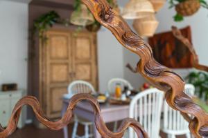 a close up of a wooden ladder in a kitchen at La Bastia - Bed & Soul in Nuvolento