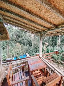 Balkón nebo terasa v ubytování Umah Kayu Ubud