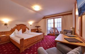 Tempat tidur dalam kamar di Landhotel zum Bad