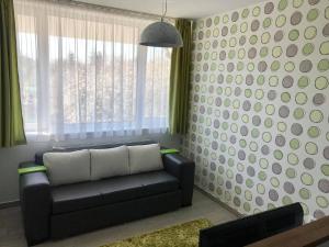 A seating area at Rubin Eszter Apartman Sárvár