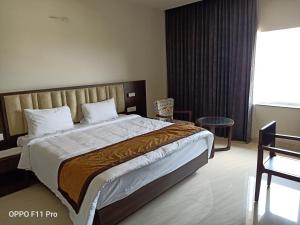 The Hotel Celebration客房内的一张或多张床位