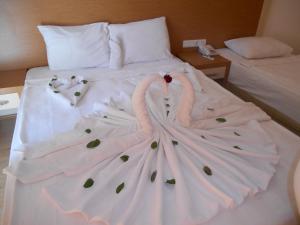 Letto o letti in una camera di Hotel Kovarna