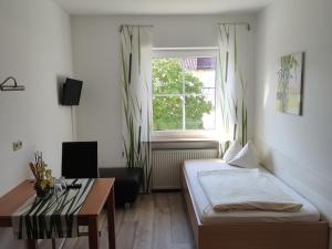 Postel nebo postele na pokoji v ubytování Landgasthof Braun