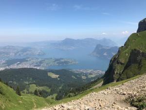 a view of a lake from a mountain at Lucerne Apartment Mount Pilatus in Luzern
