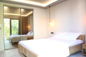Postel nebo postele na pokoji v ubytování Life Butiq Otel