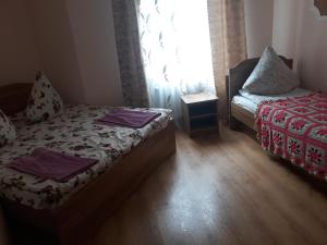 Postel nebo postele na pokoji v ubytování Над Вичов