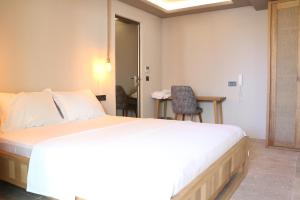 Postel nebo postele na pokoji v ubytování Life Butiq Otel