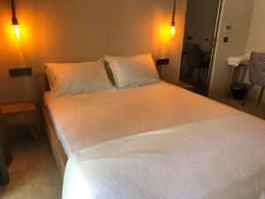Postel nebo postele na pokoji v ubytování Life Butiq Otel