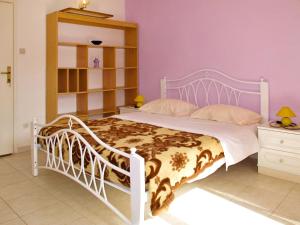 Postel nebo postele na pokoji v ubytování Apartment Pineta - ROJ104 by Interhome