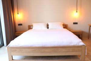 Postel nebo postele na pokoji v ubytování Life Butiq Otel