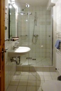 a bathroom with a shower and a sink at Apartment Bela 2 by Interhome in Nonnevitz