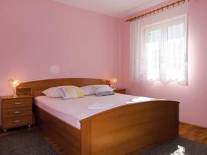 Postel nebo postele na pokoji v ubytování Apartment Hoba by Interhome