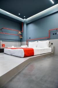 Postel nebo postele na pokoji v ubytování CentraL44 YoLo Casual Suite