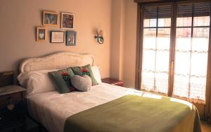 Posteľ alebo postele v izbe v ubytovaní Hotel Rural la Concordia