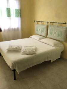 A bed or beds in a room at Junco