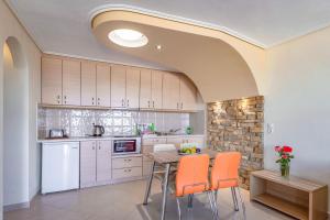 A kitchen or kitchenette at PENNY LUXURY APARTMENTS