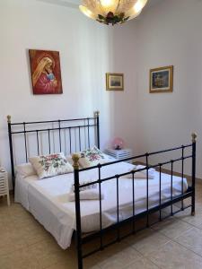 A bed or beds in a room at Fornaci Deluxe San Pietro