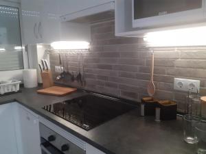 Kuchyňa alebo kuchynka v ubytovaní White Apartment