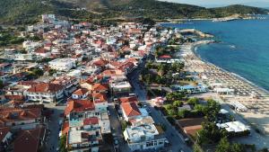 an aerial view of a town on the beach at Vergina Pension in Sarti
