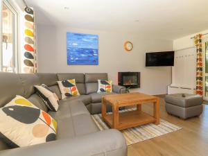 a living room with a couch and a table at 32 Trevithick in Hayle