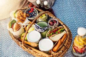 a basket filled with different types of food at Athens Green Apartments in Athens