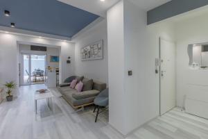 Posezení v ubytování Arena Blue Dream - modern apartment with terrace