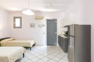 Virtuvė arba virtuvėlė apgyvendinimo įstaigoje Philoxenia Apartments