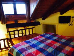 Postel nebo postele na pokoji v ubytování Hotel Can Borrell