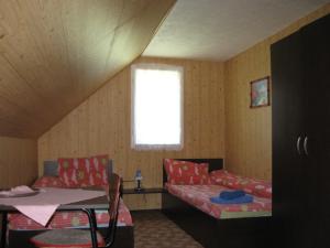 Postel nebo postele na pokoji v ubytování Podina Guest House