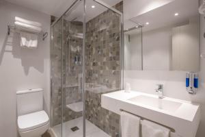 Koupelna v ubytování Hotel Zeus