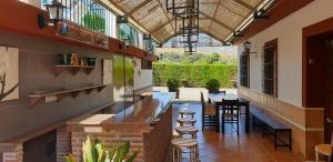 Reštaurácia alebo iné gastronomické zariadenie v ubytovaní Casa Rural Huerta Vallejo