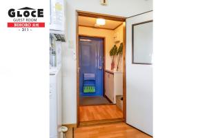 Virtuvė arba virtuvėlė apgyvendinimo įstaigoje GLOCE 美幌 ゲストルーム l BIHORO Guest room