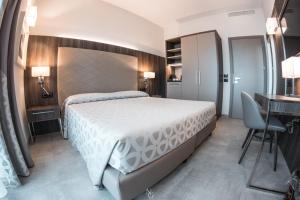Voodi või voodid majutusasutuse Hotel Kuma toas