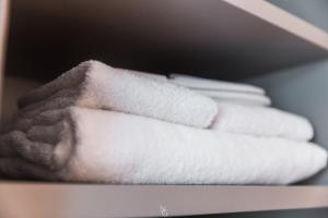Voodi või voodid majutusasutuse Hotel Kuma toas