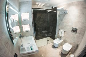 Vannituba majutusasutuses Hotel Kuma