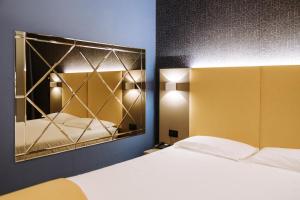 Postel nebo postele na pokoji v ubytování Hotel Motel Prestige + 37 fotografií