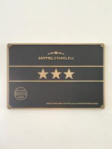 Ein Zertifikat, Auszeichnung, Logo oder anderes Dokument, das in der Unterkunft Concorde Hotel Ascot ausgestellt ist