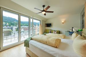 Postel nebo postele na pokoji v ubytování Hotel Garni Bodensee