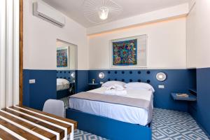 Postel nebo postele na pokoji v ubytování Maison Di Fiore B&B + 37 fotografií