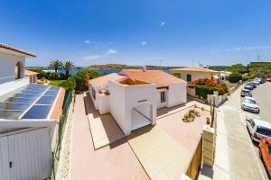 a white house with a view of a street at Villa Es Mirador de ses Altines in Na Macaret