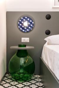 Postel nebo postele na pokoji v ubytování Maison Di Fiore B&B